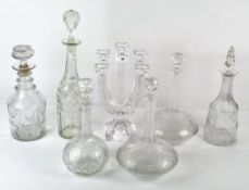 A pair of 20th century decanters together with four other decanters and a five point candlestick