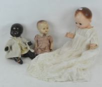 A group of three vintage dolls including one by Pedigree