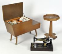 A selection of items, comprising a sewing table, Singer sewing machine and an oak occasional table,