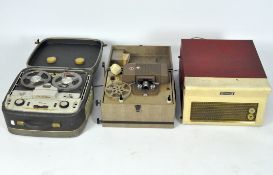A Dansette Monarch 1960's record player, a four track reel to reel player, and a projector