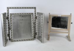 A contemporary three piece dressing table mirror, with silvered frame, height 50cm,