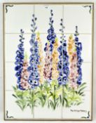 A painting of foxgloves on 12 tiles, mounted in a wood frame, inscribed The Village Pottery,
