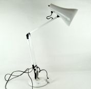A vintage anglepoise desk lamp, white in colour,