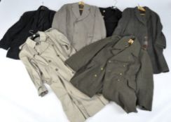 A selection of six coats, including a British Army Great coat,