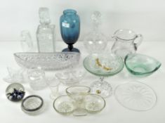 A quantity of glass, to include cut glass decanters, dishes, jugs, a blue vase