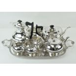 Two silver plated tea sets and a serving tray and coffee pot, length of tray including handles 59cm,