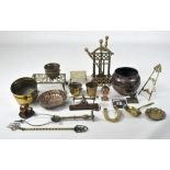 A large selection of metalware, mostly brass and copper,