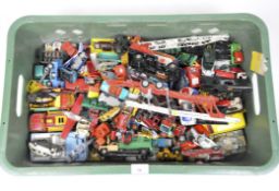 A large collection of die-cast vehicles, including Corgi Batmobile, tractors,
