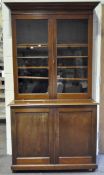 A late 19th century two part mahogany bookcase,