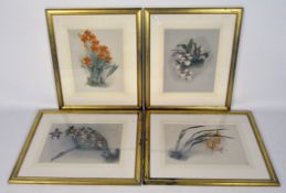 Four large floral prints, framed and glazed,