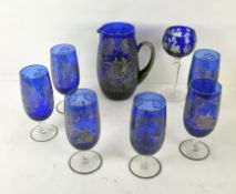 A Venetian blue glass water set of six glasses on twisted stems and a jug,