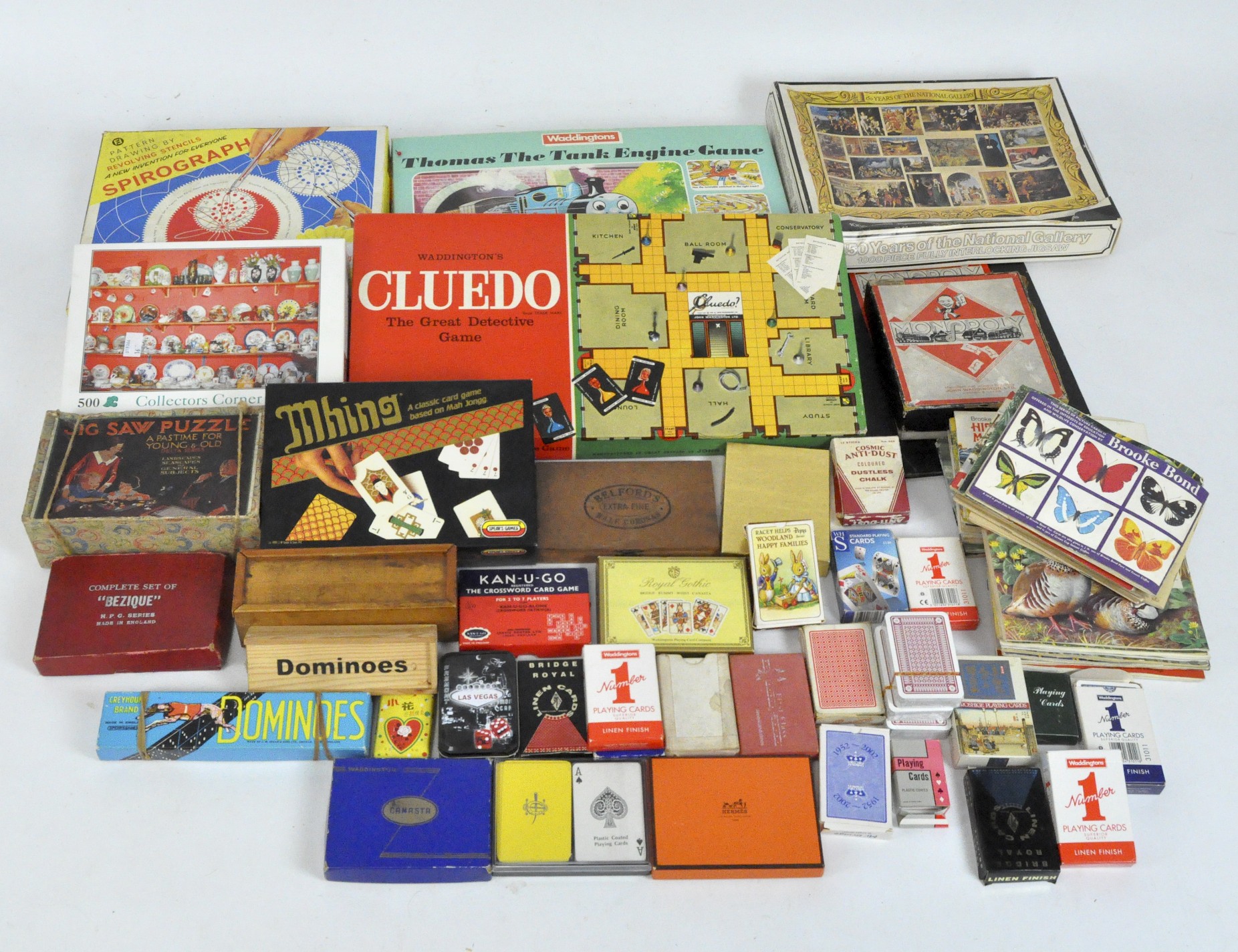 A quantity of games and puzzles including Spirograph, Cluedo,