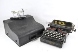 A Royal Standard Typewriter in black finish and a set of letter/gram scales