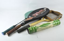 Three vintage racquets, including a Wilson Pro comp tennis racquet,
