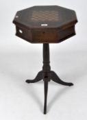 A reproduction chess top occasional table, of octagonal form, raised upon tripod base,