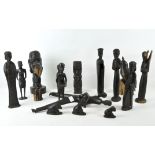 A collection of assorted African tribal wooden carvings,
