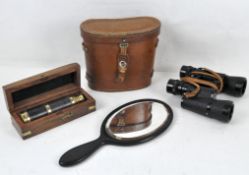 A vintage telescope, in box, a pair of Cosmos cased binoculars and a hand mirror,