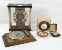 A group of clocks including a small Europa sun form clock and more
