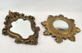 Two gilt framed wall mirrors, the smaller being a starburst design,