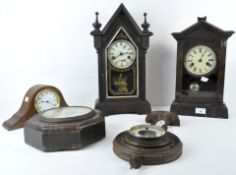 Four 20th century wall and mantle clocks, of assorted designs, all with wooden frames,