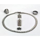 A group of silver jewellery, to include a hallmarked silver ingot pendant, Italian silver necklace,