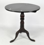 A 19th century mahogany tilt top side table on turned pedestal support and tripod foot,