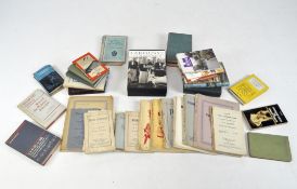 A large quantity of books along with other novels, magazines and maps