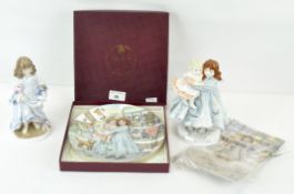 Two limited edition Royal Worcester NSPCC figurines of a girl with dolls,