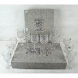 Two boxed sets of Edinburgh crystal cut glass wine glasses,