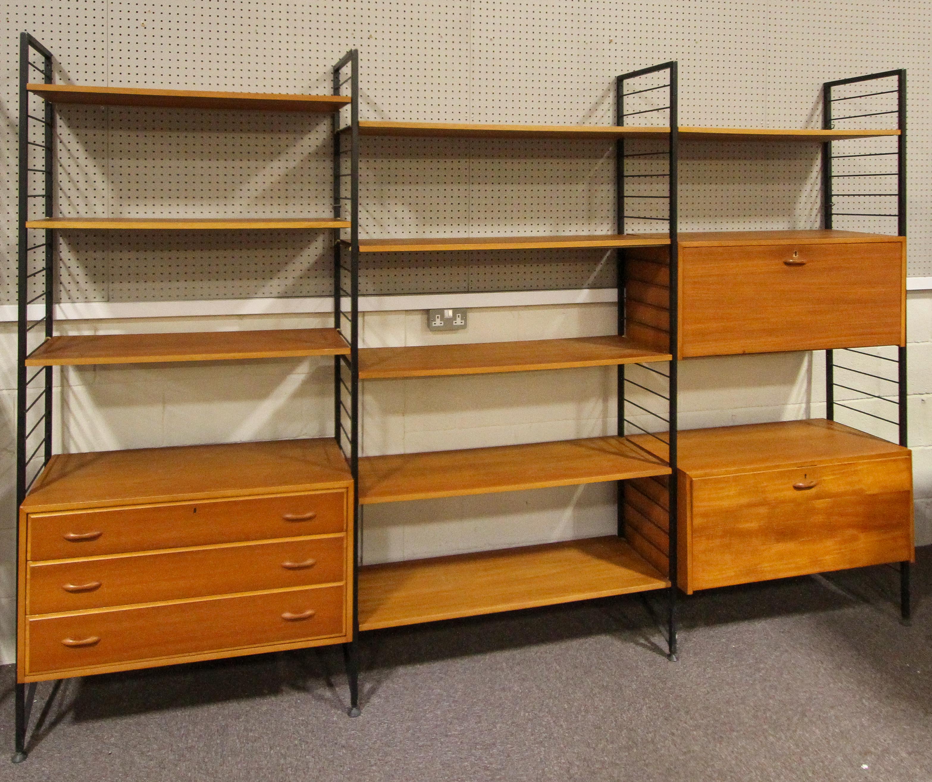 A Ladderax shelving unit, with black shelving, mid-20th century, with two teak fall front cupboards, - Image 2 of 5