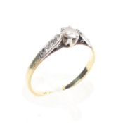 An 18ct gold platinum and diamond ring.