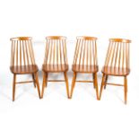 Four Ercol style spindle back chairs in light elm and beech, on tapering legs, 80.