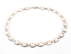 A silver flat link necklace,