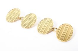 A pair of 18ct gold double oval cufflinks with engine turned decoration, 8.5g.