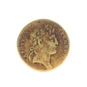 A Napoleon III yellow metal coin,