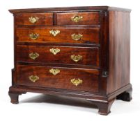 A Georgian mahogany chest of drawers, with column supports,