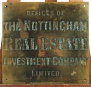 An early 20th century brass Real Estate sign,