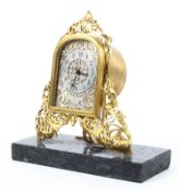 A French brass and gilt-metal mounted mantel clock, late 19th/early 20th century,