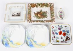 A collection of ashtrays and other items,