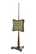 A Victorian rosewood pole fire screen,