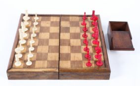 A boxed set of ivory chess men, in hinged Victorian chess box, with green baize to interior,