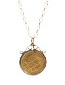 A Victorian half sovereign dated 1883 shield verso in a 9ct gold scroll mount with a 9ct chain link