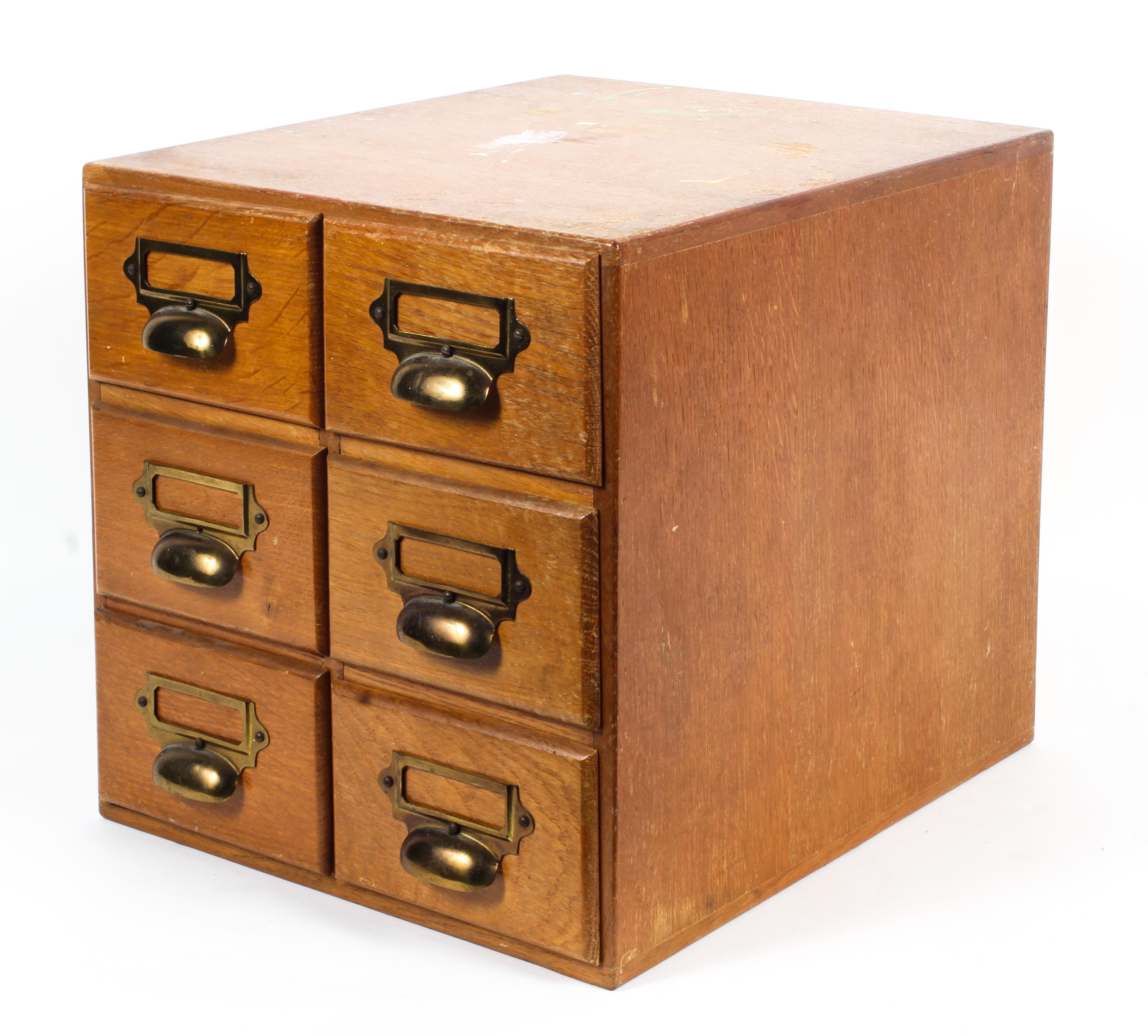 An early 20th century golden oak, six drawer filing cabinet,
