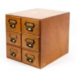 An early 20th century golden oak, six drawer filing cabinet,