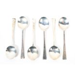 A set of six silver demi-tasse tea spoons,