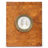 A Victorian portrait miniature of a girl on ivory, in burr oak frame