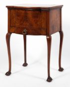 An Edwardian walnut veneered sewing box, on stand,