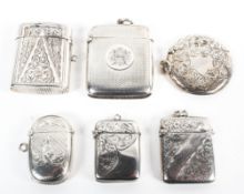 A collection of six hallmarked silver vesta cases,