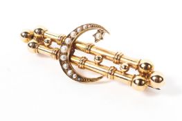A 15ct gold bar brooch, with crescent moon set with seed pearls, 5g.
