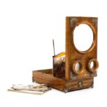 An Edwardian walnut and white metal mounted folding stereographic viewer,